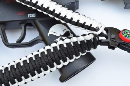 BLACK / WHITE – Paracord Single Point Tactical Rifle Sling with compass, flint, whistle buckle.